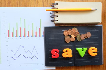 graph paper and coin with business concept