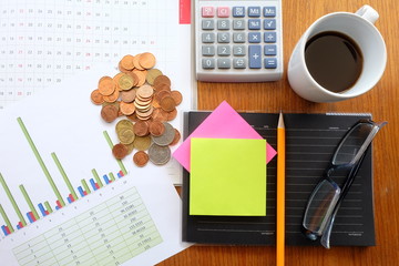 graph paper and coin with business concept