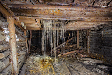 Fototapeta na wymiar scoop ramp scraper slide in gold mine underground tunnel
