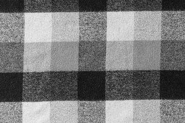 Black and white checkered plaid fabric texture for background. tartan texture