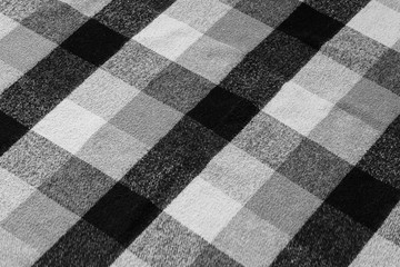 Black and white checkered plaid fabric texture for background. tartan texture