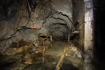 Underground old abandoned iron mine tunnel