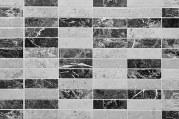 Black and white wall tile modern decorative natural mosaic for inside. Panel wall small marble brick background texture.