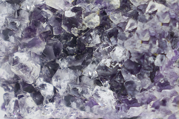 Background made of mineral. Purple amethyst crystal surface