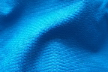 Closeup of beautiful quality cotton mixed with polyester fabric in dark blue tone for textile texture seamless pattern and cool banner or background - obrazy, fototapety, plakaty