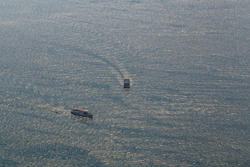 Fototapeta premium An aerial view to ships on Como lake, Italy
