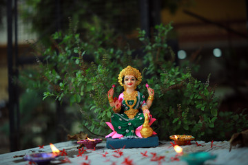 Idol of Mahalakshmi, Diya and Tulsi on the auspicious occasion of Deepawali