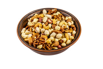 Bowl with mixed nuts isolated on white background. Walnuts, pistachio, almond, peanut, cashew, hazelnut in ceramic bowl