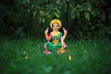 Idol of Mahalakshmi, Diya and Tulsi on the auspicious occasion of Deepawali