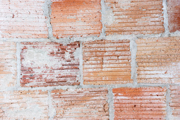 Closeup of new red brick wall in a newly built house