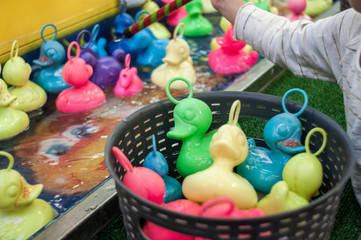 Rubber colorful ducks with hooks in their heads (funfair ducks)