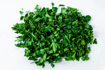 Fototapeta premium Freshly chopped green parsley. Texture, background