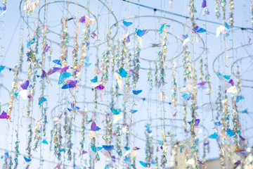 City decorations before the holiday in the form of colorful butterflies