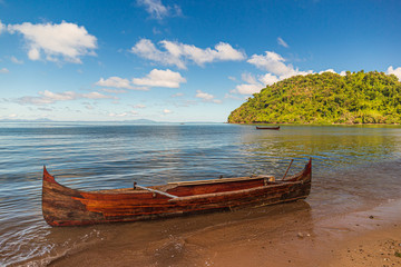 Tropical beach with traditional boat near Nosy Be, Madagascar
