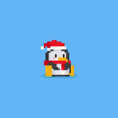 Pixel sitting penguin with santa hat and red scarf.Christmas.8bit.