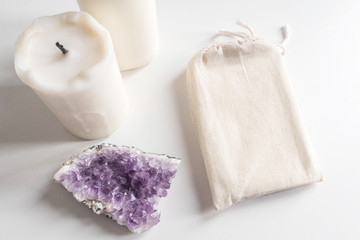 Mock up of tarot deck cotton bag, amethyst and candles on white background. Boho design of tarot...