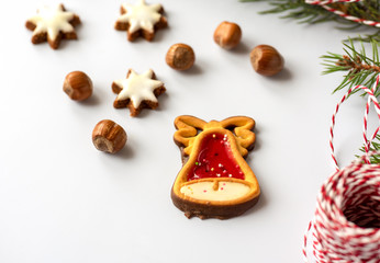 Obraz na płótnie Canvas Gingerbreads with Christmas decoration on white background 