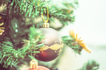 Christmas photo with holiday decorations, fir branches and festive bokeh lighting