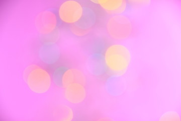 Colorful bokeh and pink background for background.
