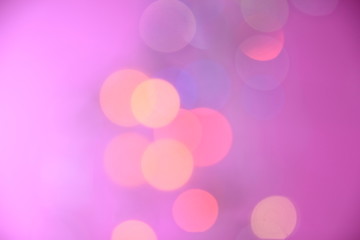 Colorful bokeh and pink background for background.