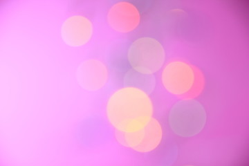 Colorful bokeh and pink background for background.