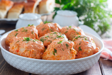 Meat balls with cabbage in a white plate,, lazy cabbage rolls, horizontal