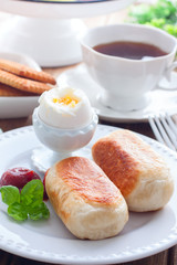 Breakfast with sausages in a yeast dough, selective focus