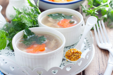 Fish fillet in portioned white bowls, horizontal