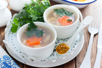 Fish fillet in portioned white bowls, horizontal