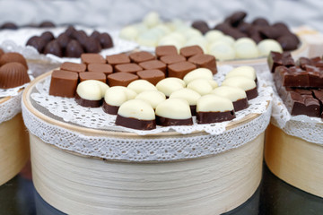Assortment of delicious marmalade jelly candies  for sale on counter of shop, market, cafe.