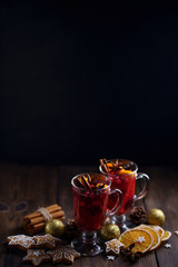 Christmas magic atmosphere, home celebration. Hot mulled wine, spices and festive decorations....