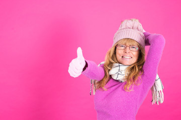 adult woman with warm clothes isolated on color background