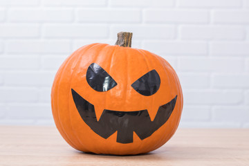 halloween pumpkin on brick background