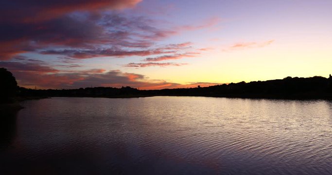 This is a video of a colorful sunset over lake Lewisville in Highland Village Texas.