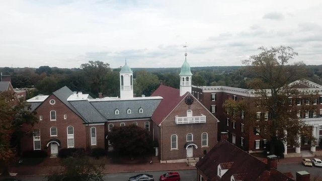 Aerial Push in to Home Moravian Church in Old Salem in Winston Salem NC in Fall