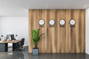 Stylish office with clocks showing world time - obrazy, fototapety, plakaty