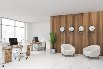 Wooden international company office corner, clocks