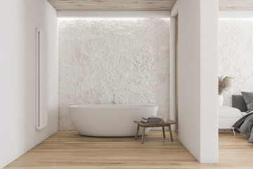 White bedroom and bathroom interior