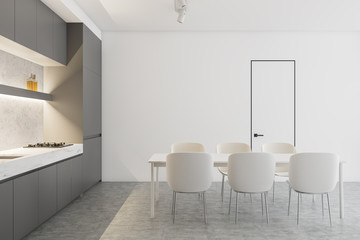 Stylish white and gray kitchen with table