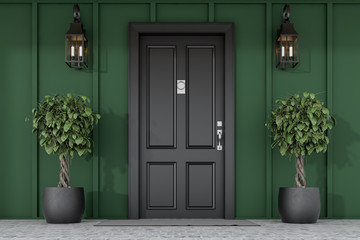 Black front door of green house with trees