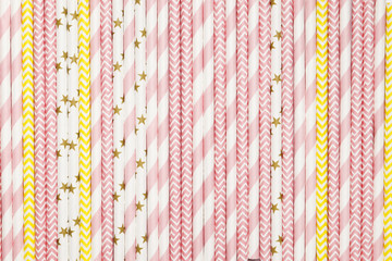Background of different pink, Yellow paper straws