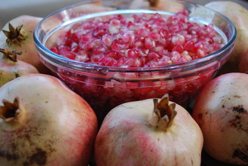 Pomegranate Fruits and Seeds in Bowl