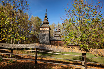 Ancient village wooden church in Museum of Folk Architecture and Rural Life in Lviv (Shevchenkivsky...