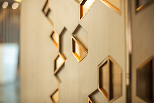 Golden shapes as wall decration