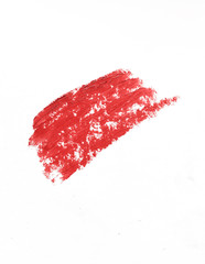 Photo of smear of red lipstick.