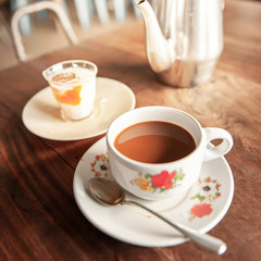 Relaxing in an old coffee shop in early morning.