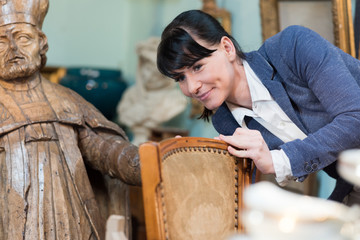 woman checking a chair
