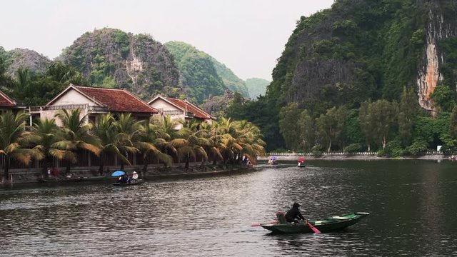 Tourists take boat tours from Ninh Binh in Northern Vietnam
