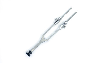 Medical, metal tools used in cosmetology, on a white isolated background, top view. Ruler for facelift.