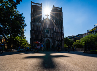 A Cross shadow of St. Joseph's Cathedral church (19th-century Gothic Revival church) on Nha Tho...